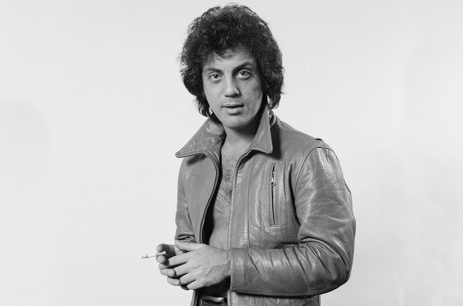 Billy Joel flashing chest hair in 1978.